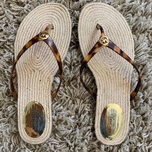 Michael Kors tortoise flip flop sandals